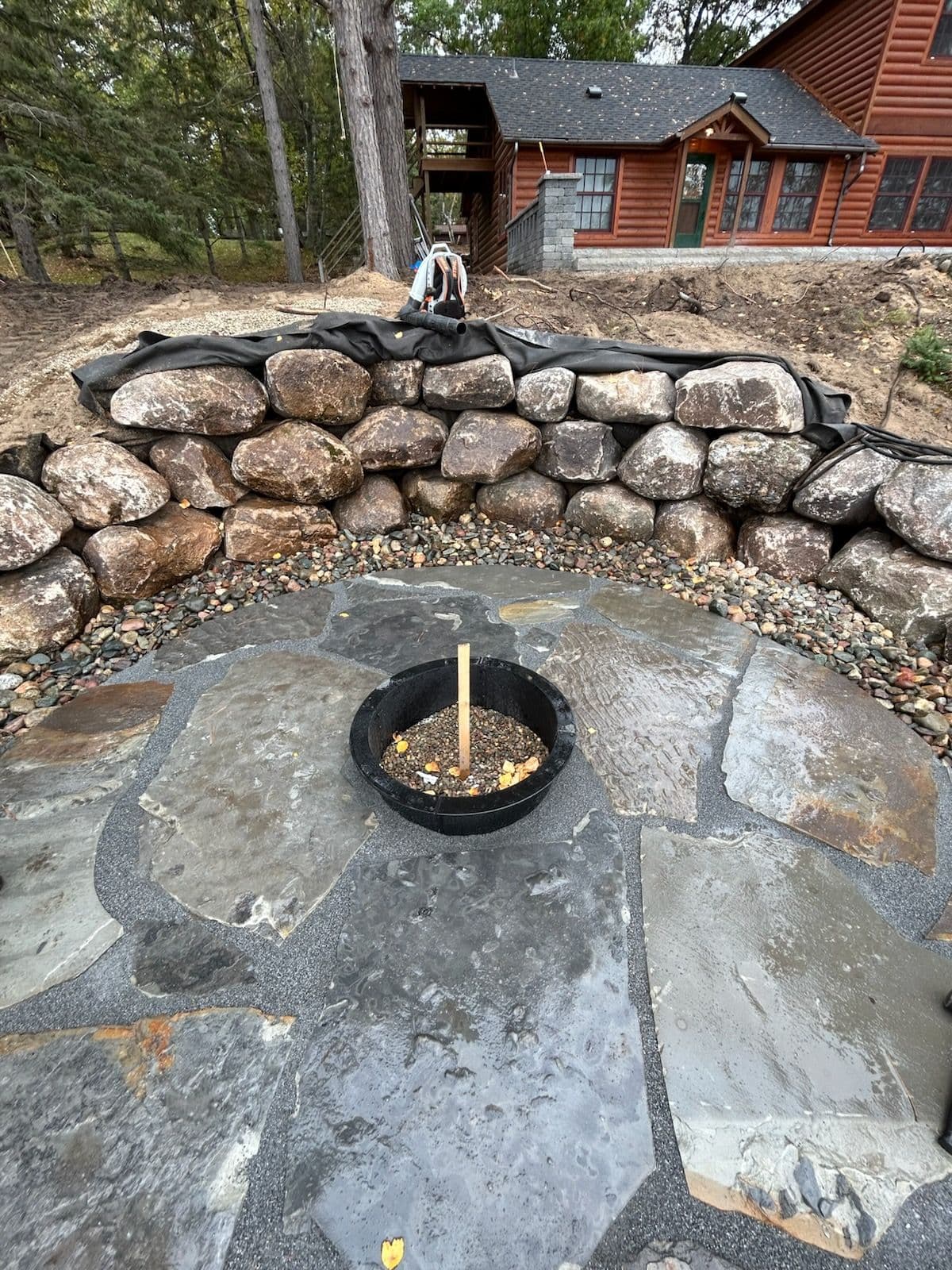 Charming Outdoor Space with Flagstone Fire Pit image